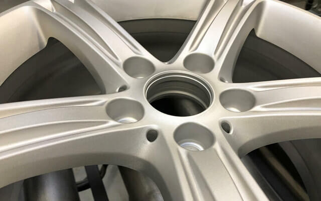 Polished alloy vehicle wheel.