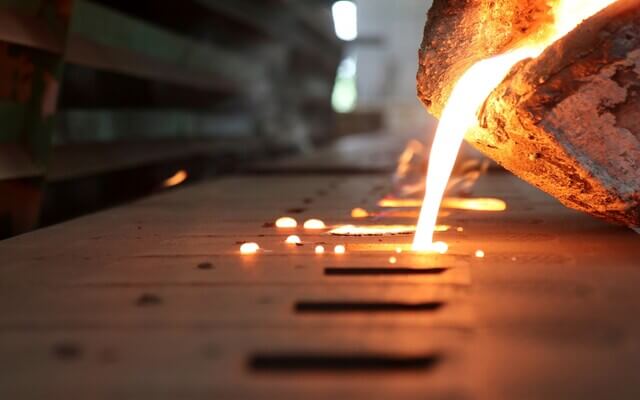 Molten steel being poured into a mold.